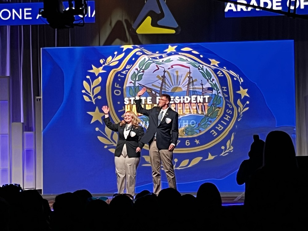 PMHS Student Dillon Miller on stage at FBLA annual conference
