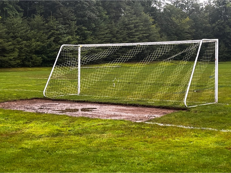 soccer goal with an area excavated for sod replacement